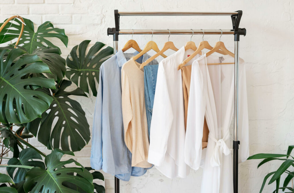 A capsule wardrobe with beige, white, and blue tones.