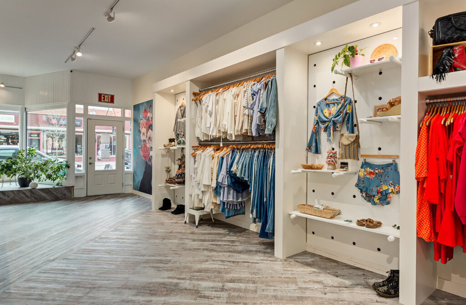 A wide-angle view of the front entrance of The Peacock Boutique's Inglewood location.